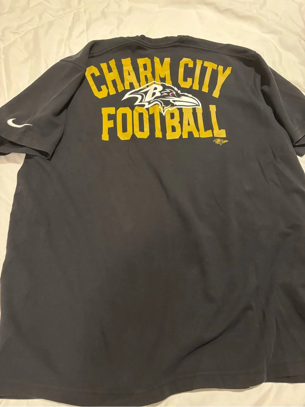 Nike Black Baltimore Ravens Short Sleeve Graphic Tee with Gold Accent EST 1996